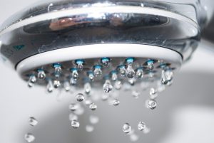 shower head dripping water