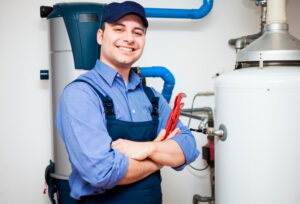 technician-servicing-hot-water-heater